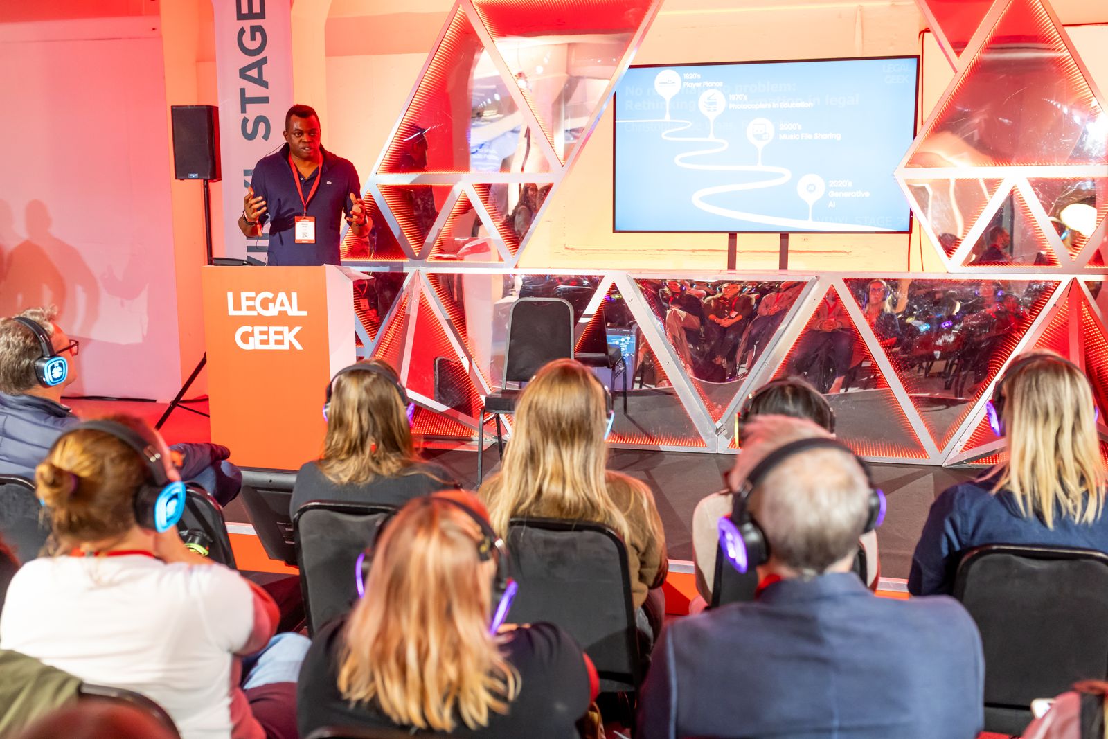 Ossie Ikeogu speaking on stage at Legal Geek